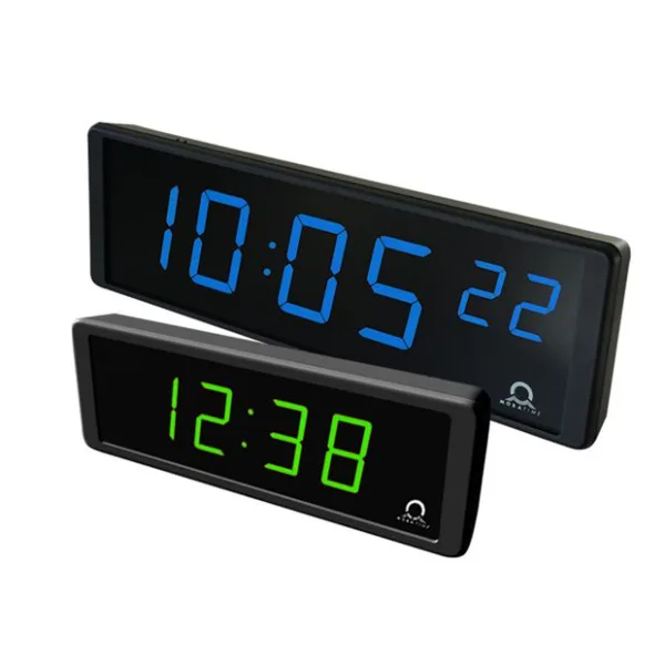 Mobatime-ECO-DC-BG_compressed-600x600 » advanceIT › Two digital alarm clocks, one showing 10:05:22 in blue and the other showing 12:38 in green.