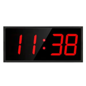 NTP54Red_compressed » advanceIT › Digital clock displaying 11:38 on a black LED panel with a gray frame on the sides.